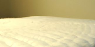 do you put mattress protector over mattress pad