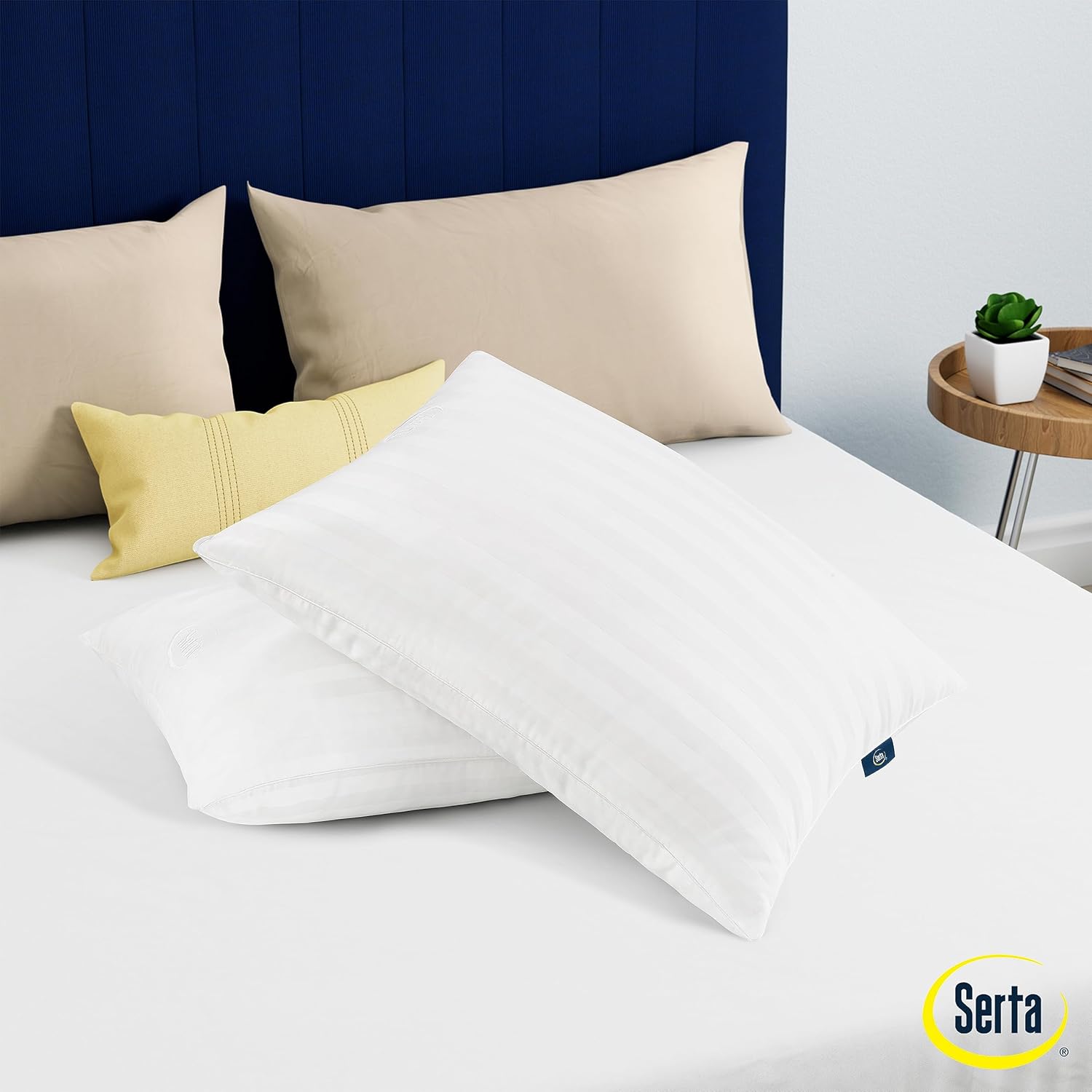 Serta Wont Go Flat Standard/Queen Size Set of Down Alternative Bed Pillows, Extra Life Foam Core with Medium Support, Perfect for Back, Stomach or Side Sleepers, White Serta Wont Go Flat Standard/Queen Size Set of Down Alternative Bed Pillows, Extra Life Foam Core with Medium Support, Perfect for Back, Stomach or Side Sleepers, White